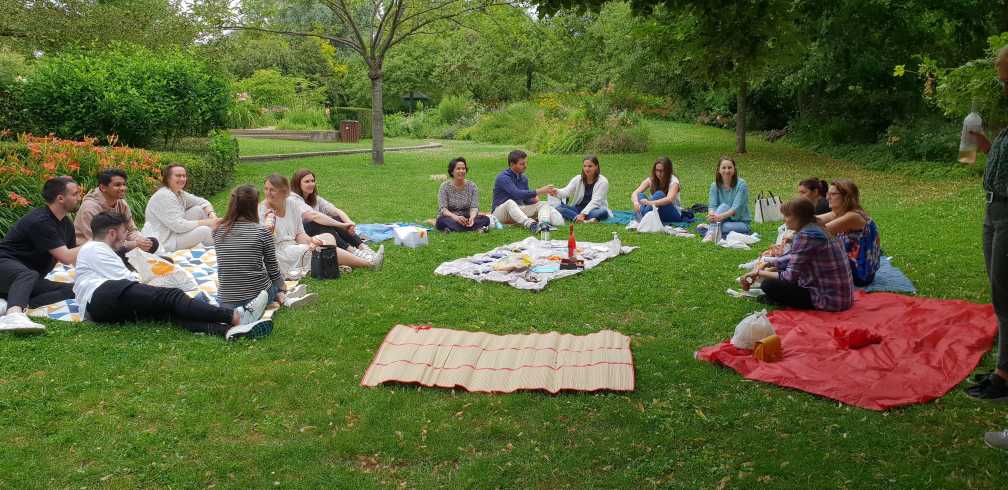 Employees at Start People France enjoying a moment at picnic
