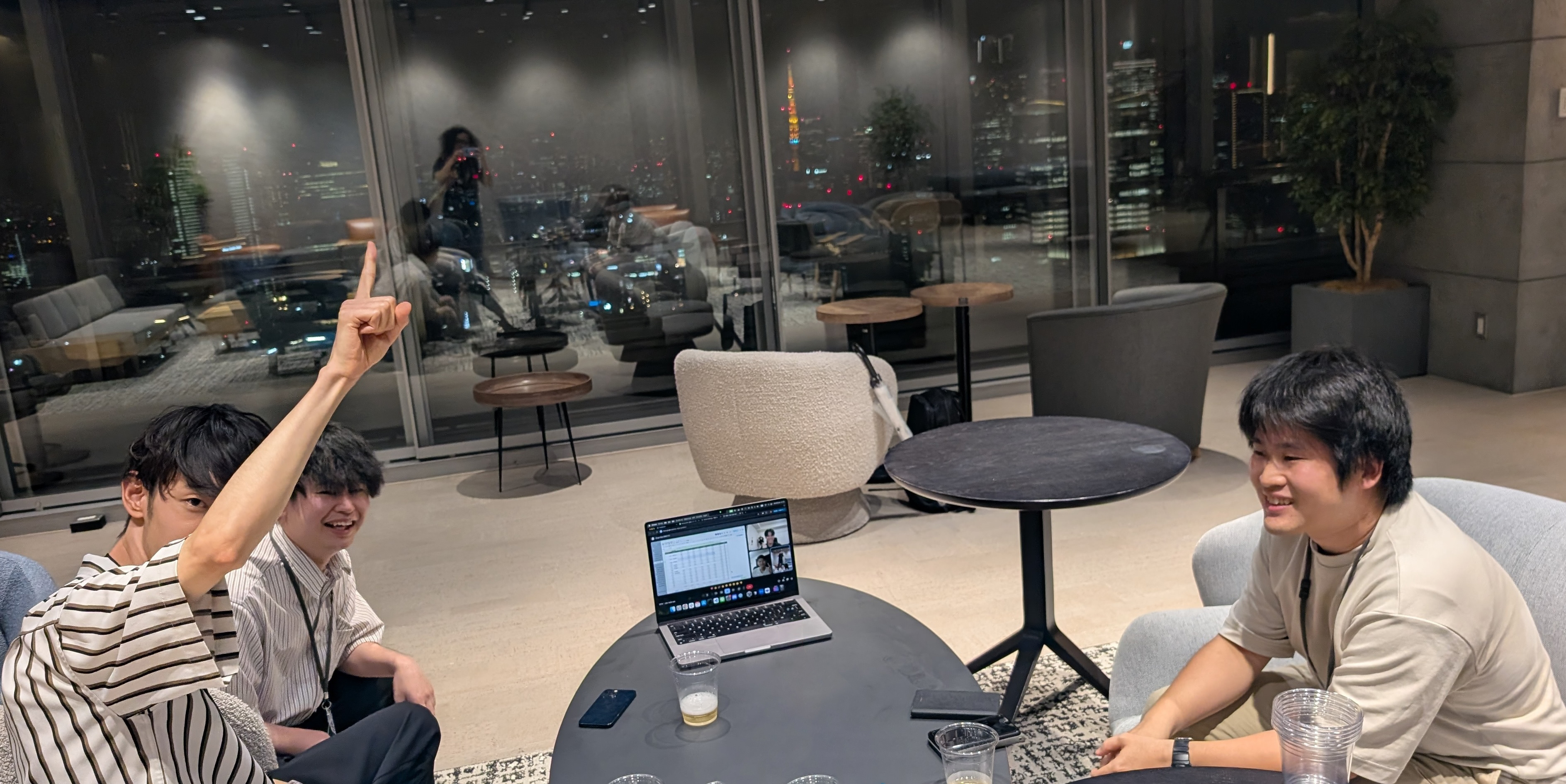 Members of the volunteer team “rec2” watching for the RecSys Challenge 2025 final results in their office